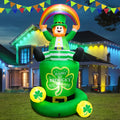 Leprechaun inflatable holding a rainbow over his head, sitting in a Happy St. Patrick's Day hat